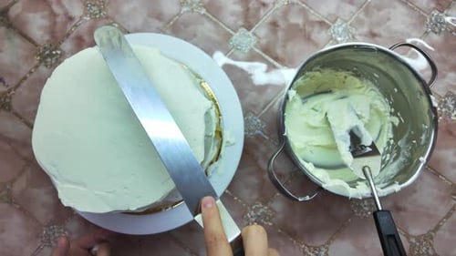 Cake Decorating with Creamy White Frosting