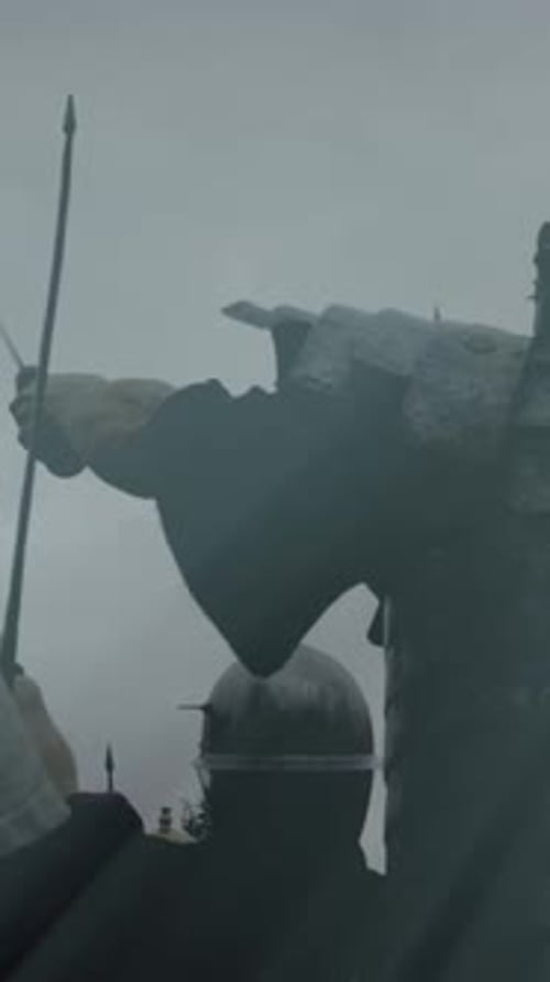 Figures in Armor with Swords and Helmets