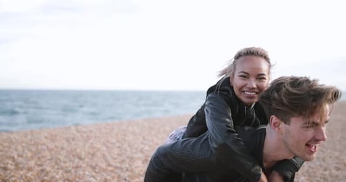 Excited friends on the beach