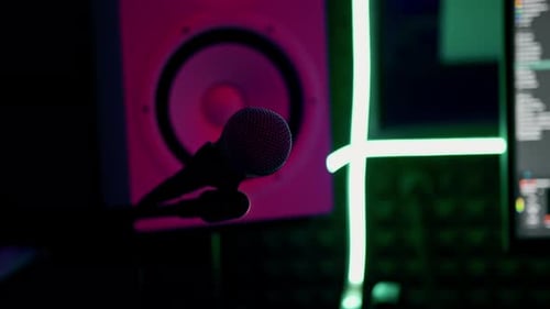 professional recording studio song recording equipment microphone close-up bottom view neon light