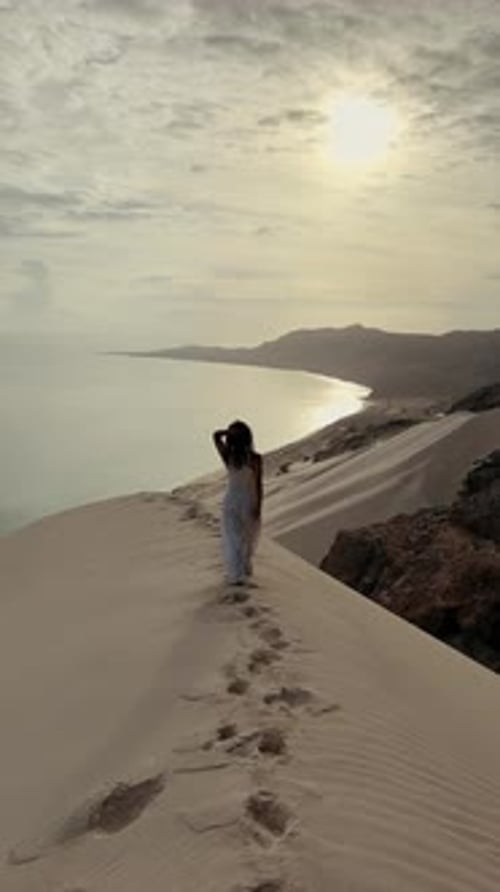 Enjoy a Serene and Beautiful Beachwalk at Dusk Along the Majestic Sand Dunes By the Ocean