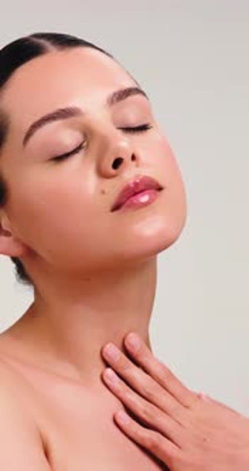 Woman, touch and skincare with beauty for cosmetics or cosmetology on studio background