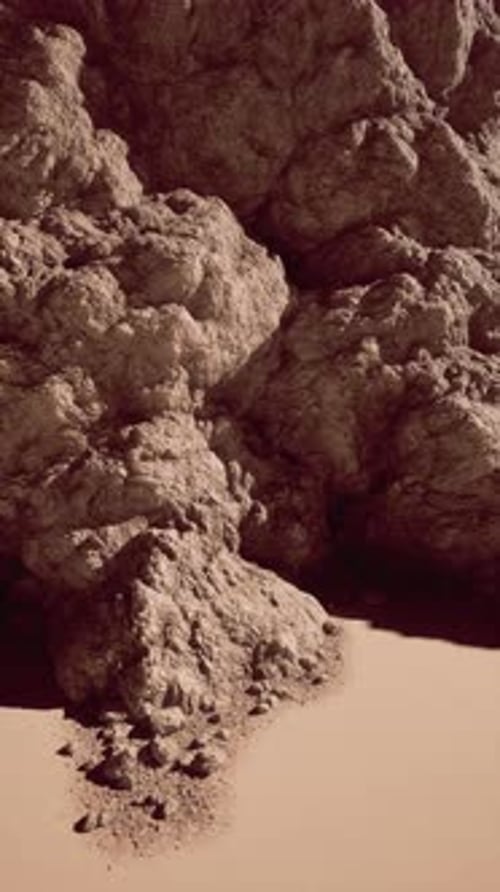 Rock Formation Amid Desert Sands