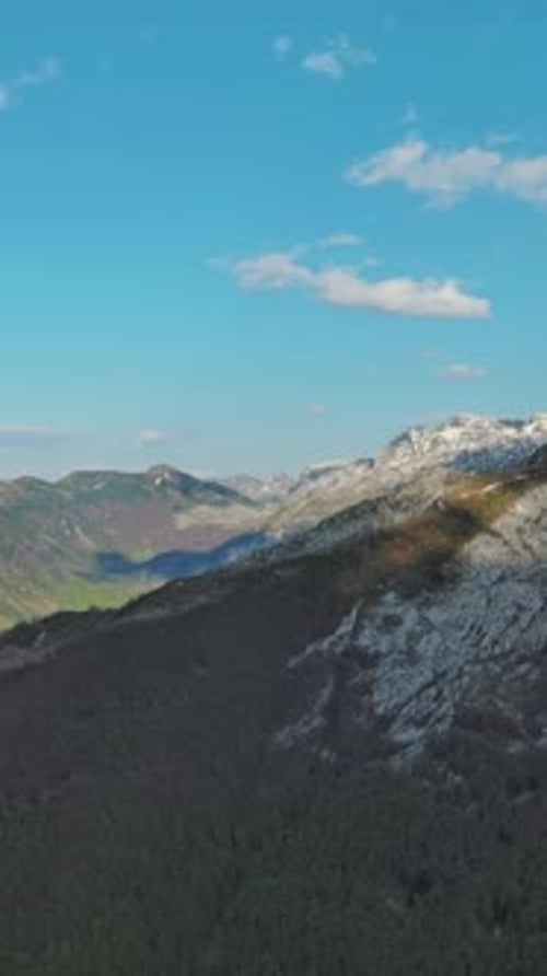 Rocky mountains and valley before sunset aerial