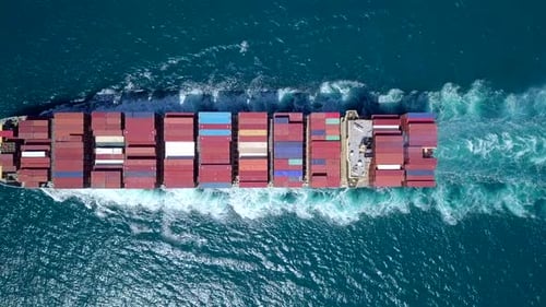 Aerial footage of a container ship at the East Mediterranean Sea.