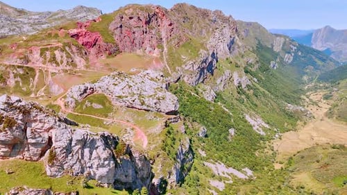 Aerial View of Winding Road in Mountain Landscape