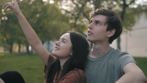 Young Couple Enjoying Day Together in Urban Park