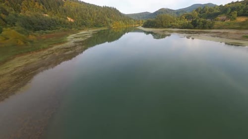 Inspiring Shot of Magnificent Countryside Valley with Cinematic Peaceful Lake Green Beautiful Forest