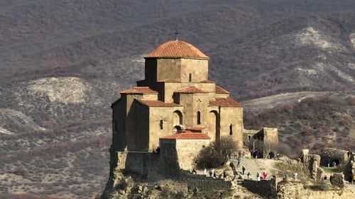 Flying around the historic Jvari monastery from 6th century in Mtskheta, Georgia. Aerial footage