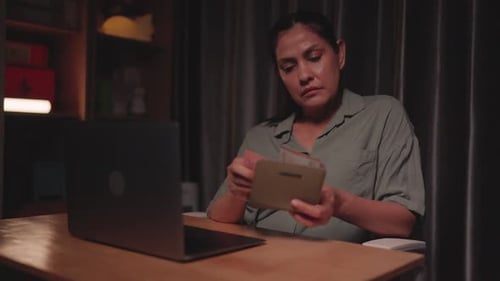 Working woman counting money in wallet, financial problems, savings planning