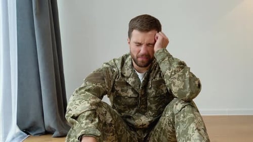Soldier Suffering From Depression Psychological Trauma PTSD Concept