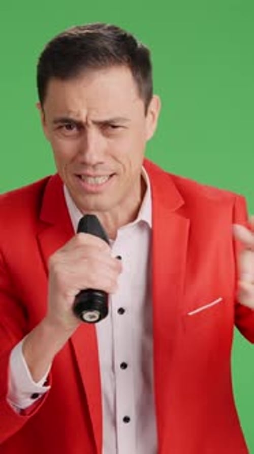 Enthusiastic Showman Introducing Performer on Green Screen