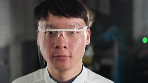 Young Adult Wearing Transparent Face Shield