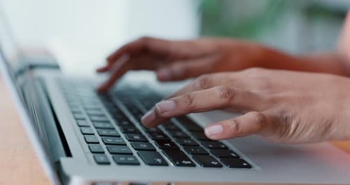 Hands typing on keyboard, a software engineer or woman programmer writing code for cyber security
