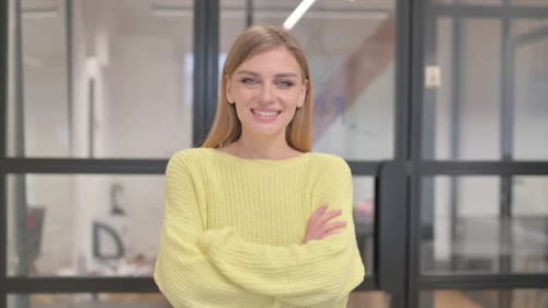 Smiling Young Adult Woman Poses Indoors