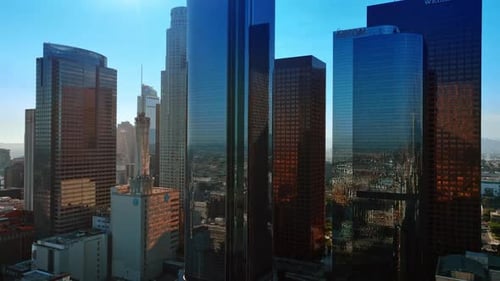 Stunning glass-surfaced skyscrapers of Los Angeles. Rising above the gorgeous city downtown