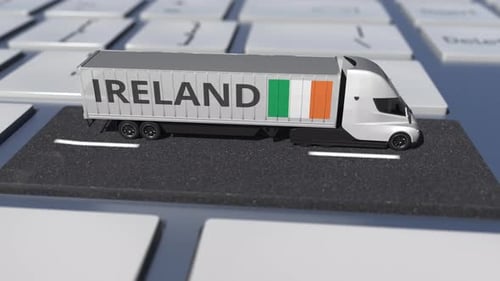 Truck with Flag of Ireland Moves on the Keyboard Key