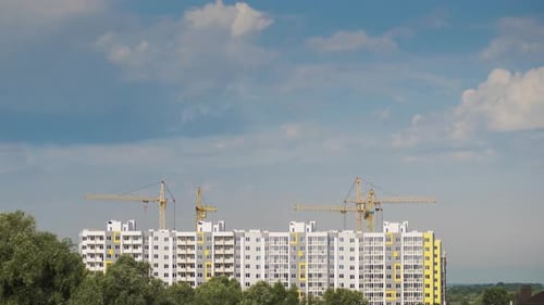 Construction Cranes are Working on a Multistorey Residential Building No Birds Timelapse Video