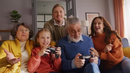 Family Playing Video Games Together on Couch