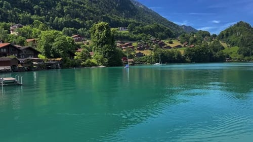 Lakeside Town And Wooden Jetty At Lake Brienz In The Canton of Bern, Switzerland. Aerial Panning Rig