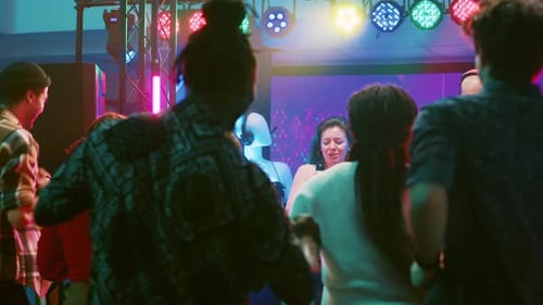 Singer Performing on Stage at Lively Party