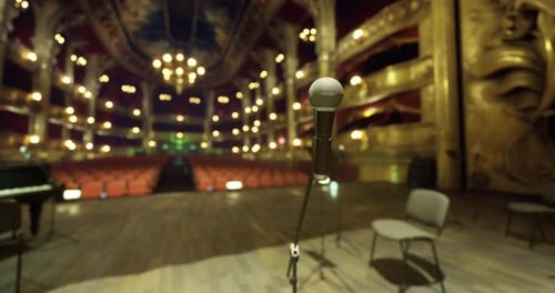 Microphone on Stage in a Grand Theater Before Performance Begins