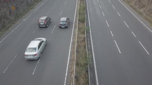 Multi-lane Mumbai Bangalore highway traffic near Pune, road travel in India