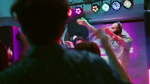 Band and DJ Performing at Nightclub Party