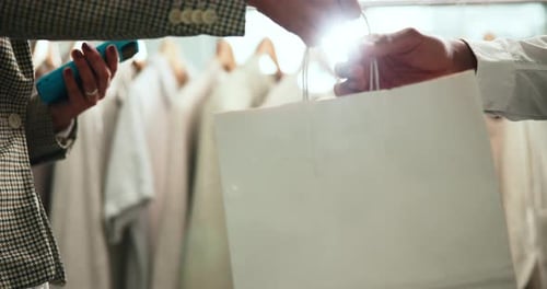 Shopping, customer and hands with bag in store for bargain, retail sale and discount
