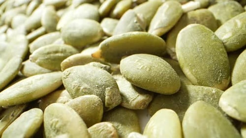 Vibrant and nutritious, green pumpkin kernels are nature's gems.