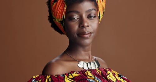 Happy, African fashion or face of black woman in studio on a brown background for trendy style