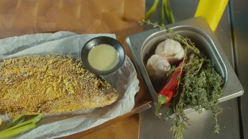 Fried Fish Served With Herbs and Lemon