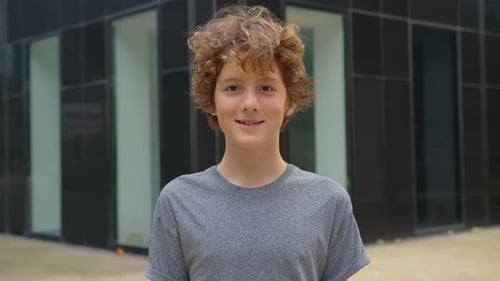Portrait of Happy School Boy Smiling Schoolboy Little Boy Child with Laptop Alone Standing at Sun