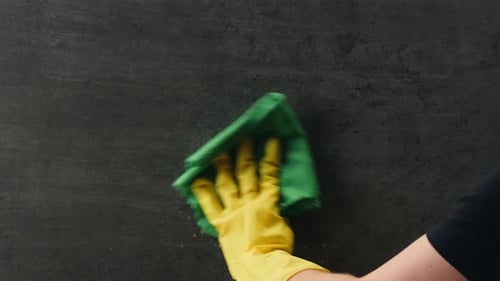 Cleaning Service Close Up of Woman Cleaning Table at Home with Spray Homework Clean of Ditry Kitchen