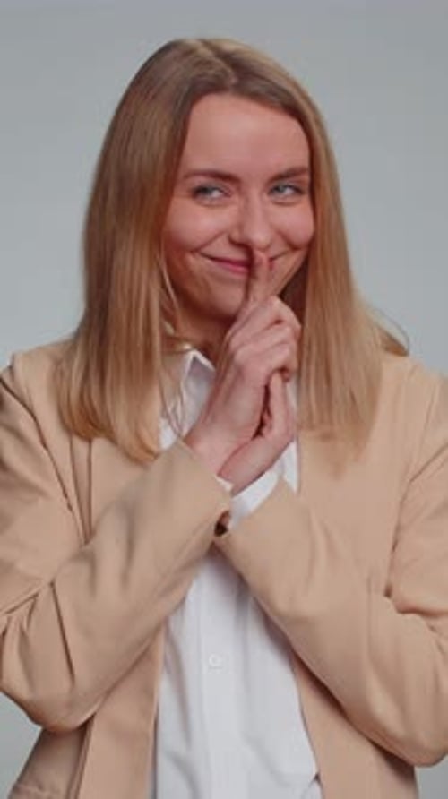 Sneaky Businesswoman Conspiring Scheming Thinking Tricky Plan with Cunning Expression Joke Prank