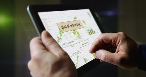 Global warming charts graphs on touchscreen pad display