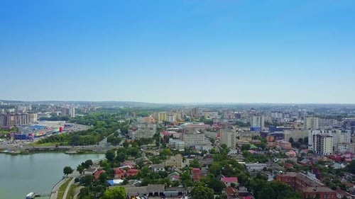 Wonderful view of the vibrant city on clear sunny daytime. River dividing the area into two parts