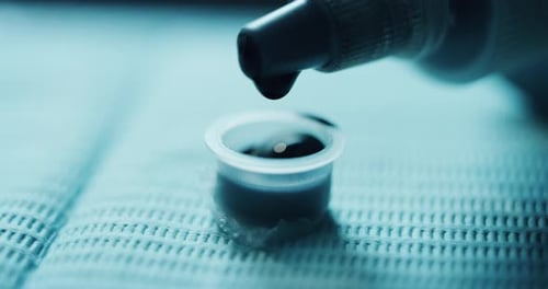 Dark Liquid Filling Small Transparent Container