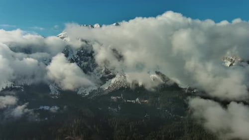 Aerial View of Clouds and Mountains