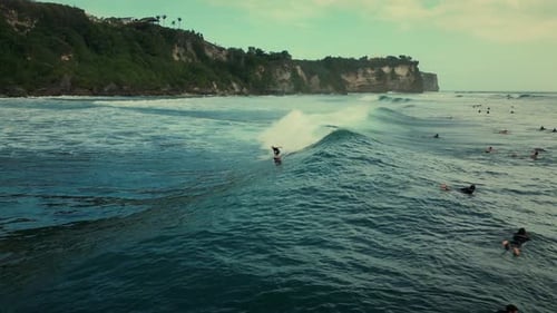 Retired Athlete Surfs Seasurfing Ocean Lifestyle Extreme sportsSurfer Rides Big Wave in Vietnam
