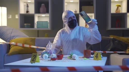 Forensics Professional Collects Crime Scene Evidence