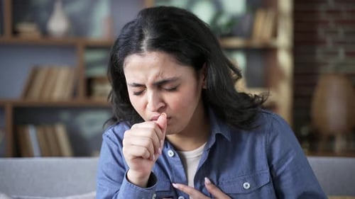 Woman Cries and Coughs in Indoor Setting