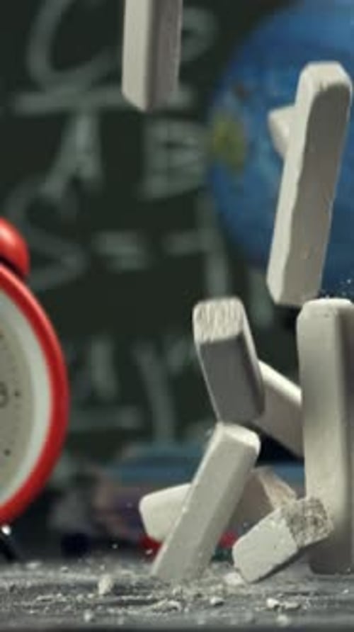 School Chalk Falls on the Desk Filmed on a Highspeed Camera at 1000 Fps