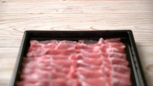 Close Up of Sliced Raw Pork on Tray