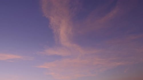 Colorful Dawn Sky with Wispy Clouds