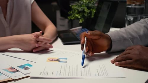 Close Up of CV Document Evaluation in a Corporate Job Interview