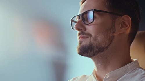 Slo Mo Shot of Man Business Analytic Browsing Financial Reports Focused Content Researcher Guy in