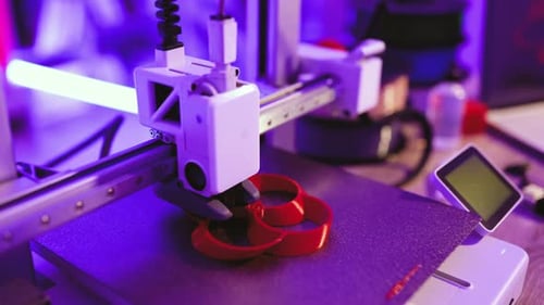 3D Printer Creating Red Object