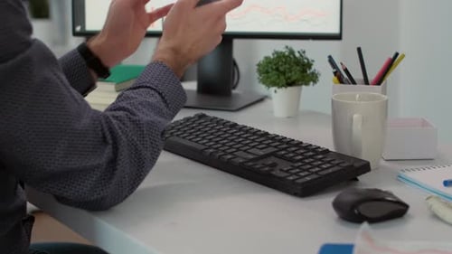 Adult Typing on Keyboard and Using Smartphone