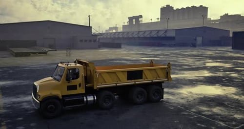Heavy Duty Dump Truck Driving Through Industrial Site